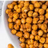 Chickpeas in a bowl, text overlay reads "air fryer crispy chickpeas, rachelcooks.com"