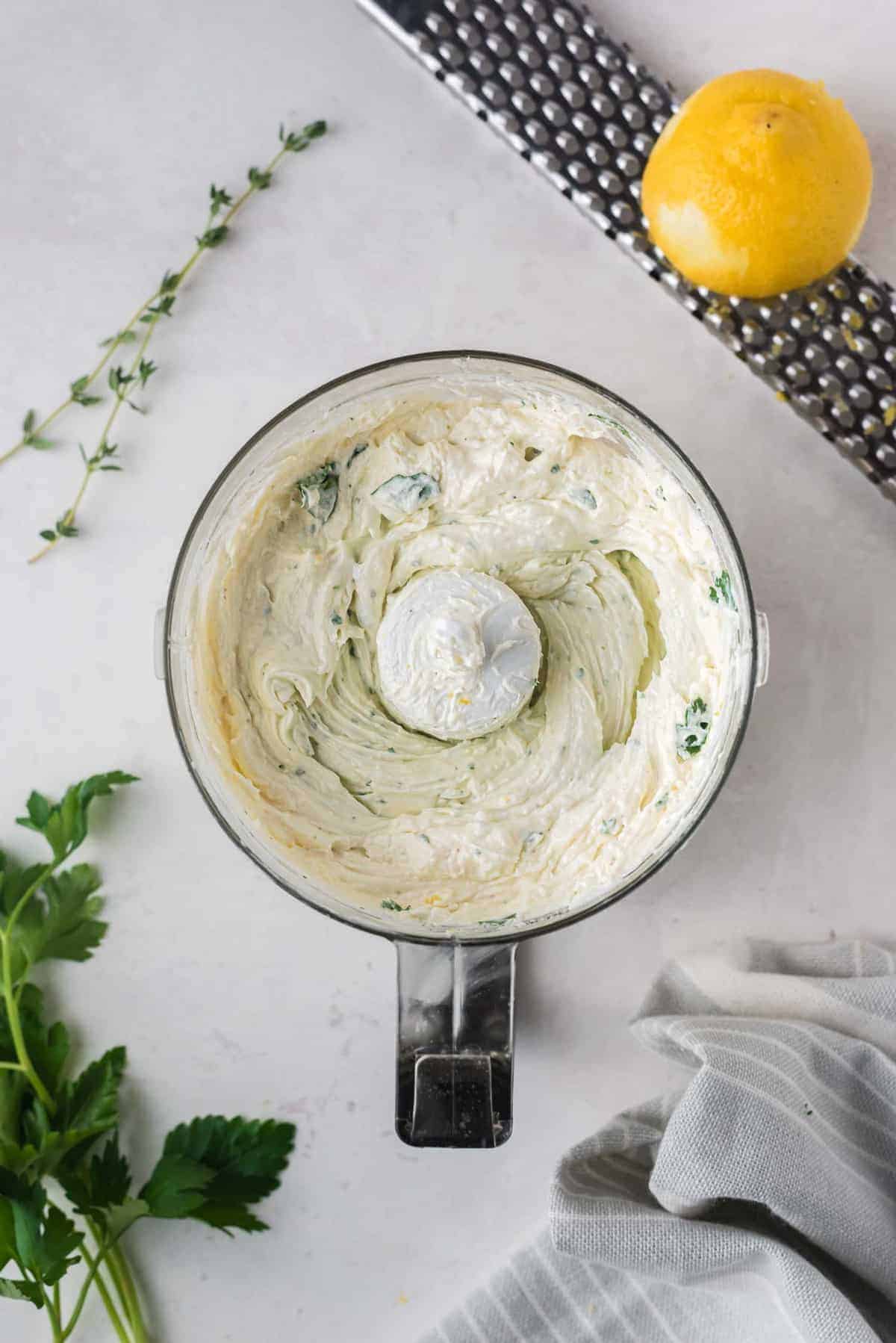 Goat cheese dip in a food processor.