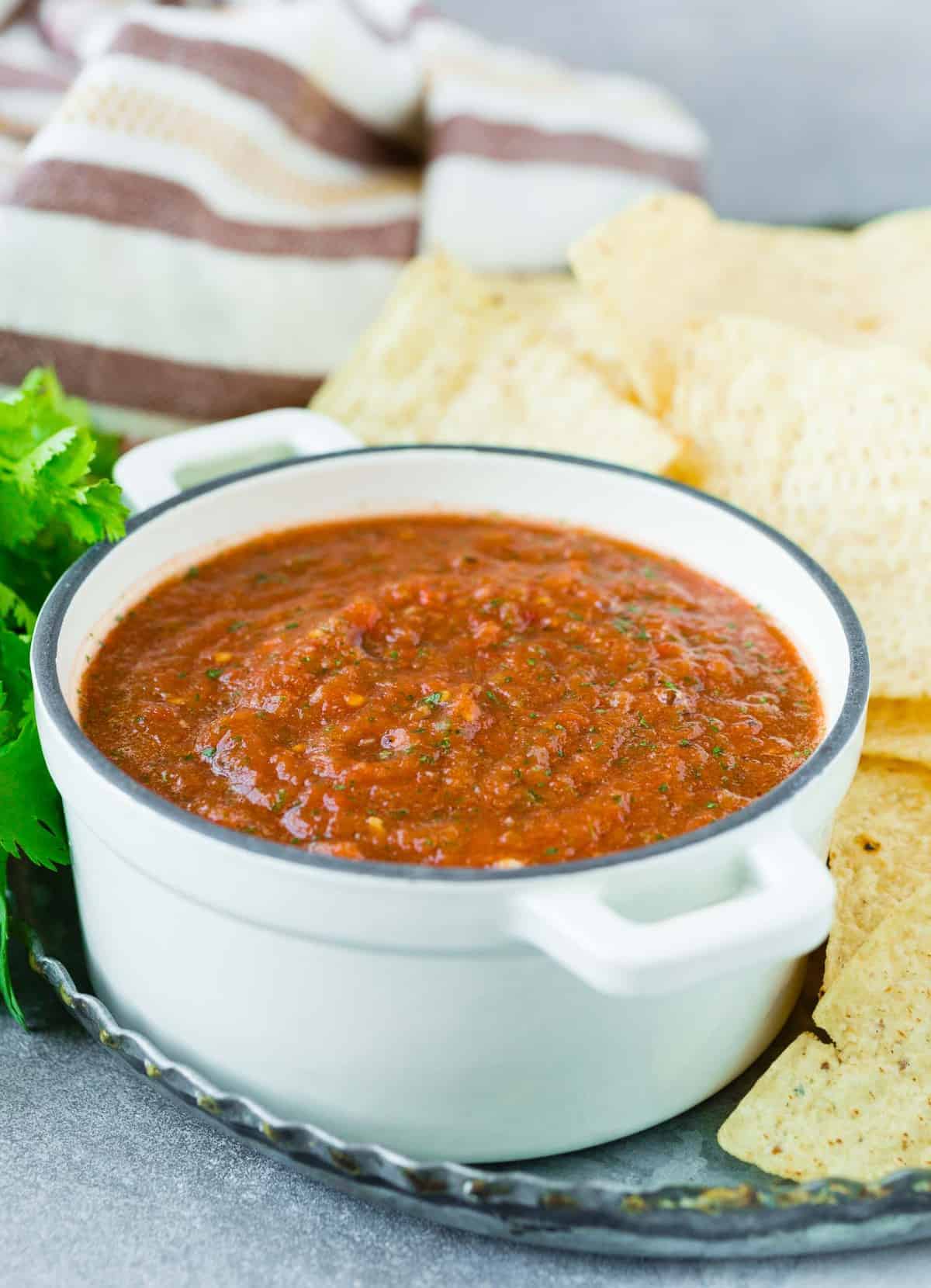 Salsa in a mini enameled cast iron pot.