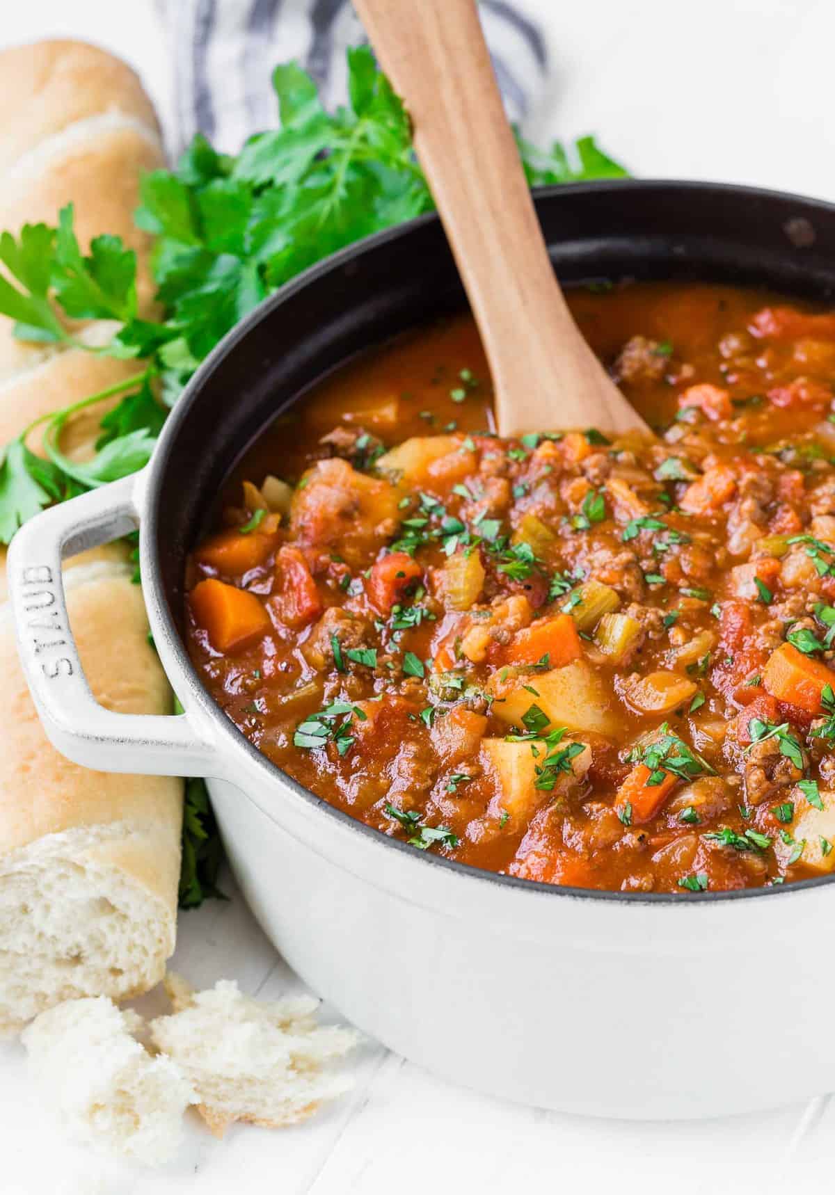 Soup in a large white dutch oven.