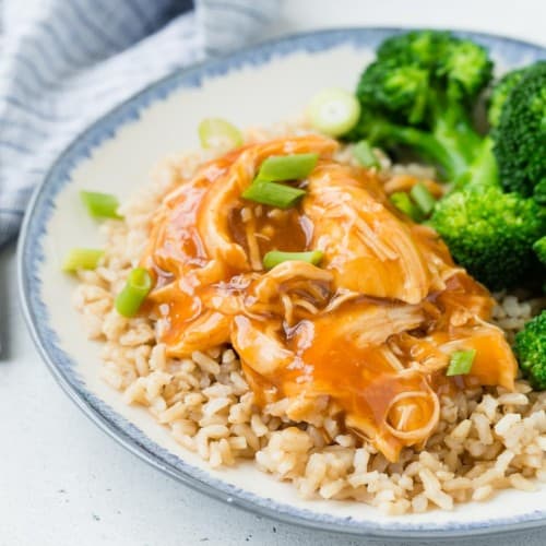 Honey and sriracha glazed shredded chicken over rice, served with steamed broccoli.