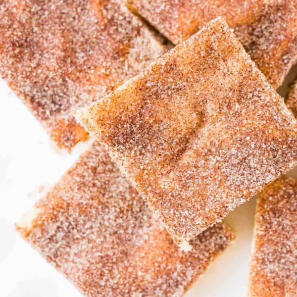 Overhead view of cinnamon sugar dusted square bars
