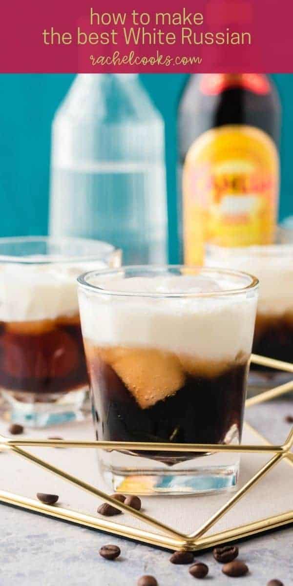 A short clear glass with a layered dark brown and white drink. Text overlay reads "how to make the best white russian, rachelcooks.com"