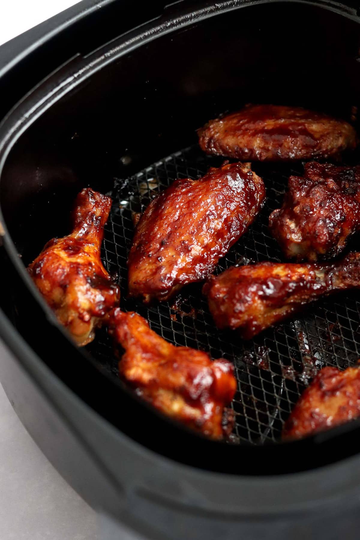 BBQ chicken wings in an air fryer.