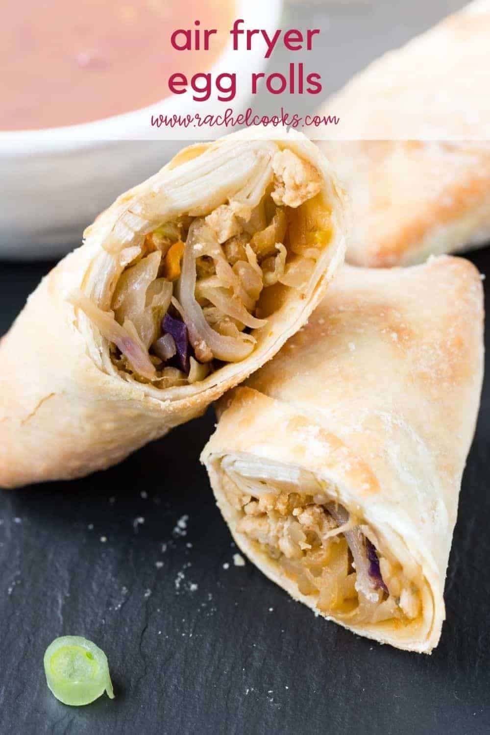 Cut open egg roll, text overlay reads "air fryer egg rolls, rachelcooks.com"