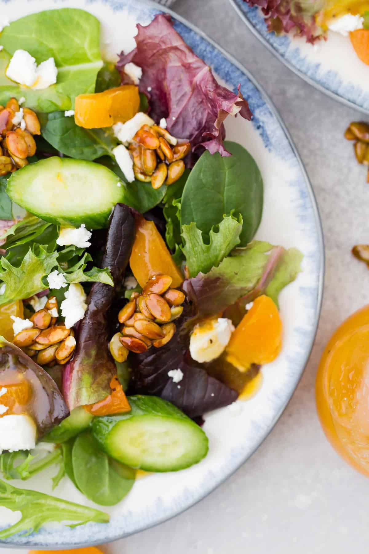 salad with dried apricots, cucumbers, pepitas.