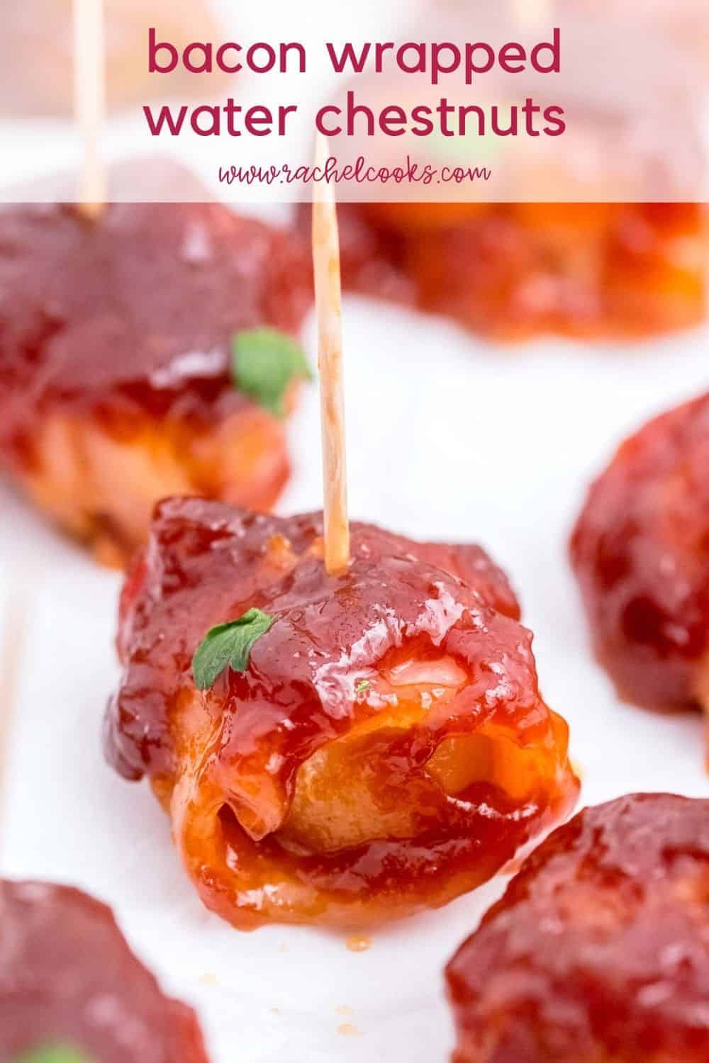 Close up of an appetizer on a toothpick, text overlay reads "easy bacon wrapped water chestnuts"