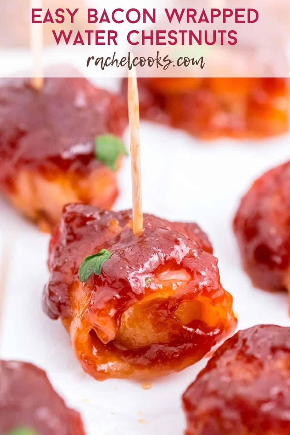 Close up of an appetizer on a toothpick, text overlay reads "easy bacon wrapped water chestnuts"