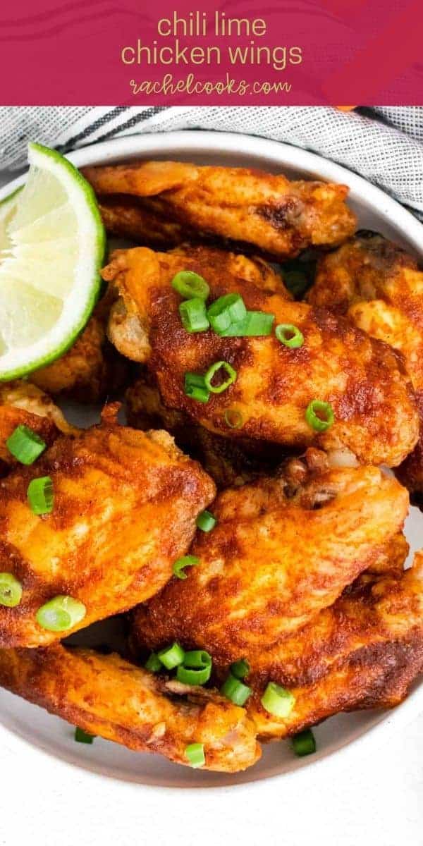 Wings in a white dish, text overlay reads "chili lime chicken wings"