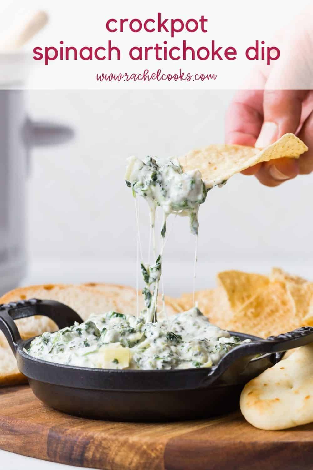 Spinach dip in a black dish, text overlay reads "crockpot spinach artichoke dip, rachelcooks.com"