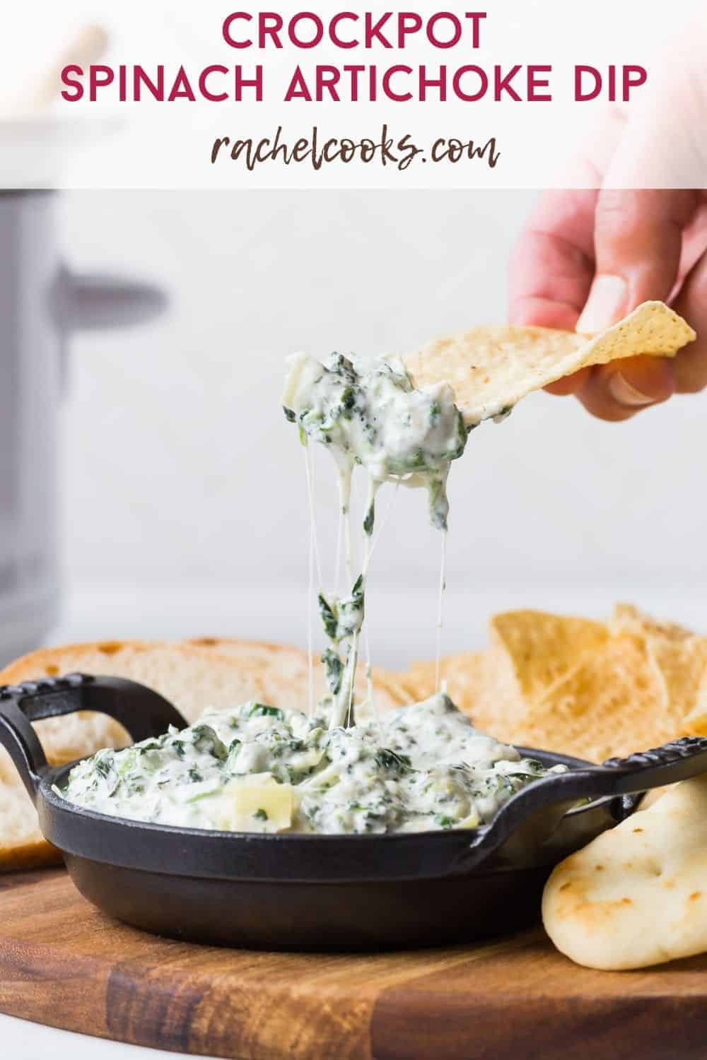 Spinach dip in a black dish, text overlay reads "crockpot spinach artichoke dip, rachelcooks.com"