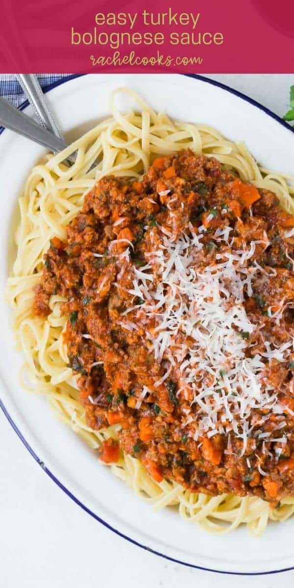 Large platter of pasta, text overlay reads "easy turkey bolognese sauce, rachelcooks.com"