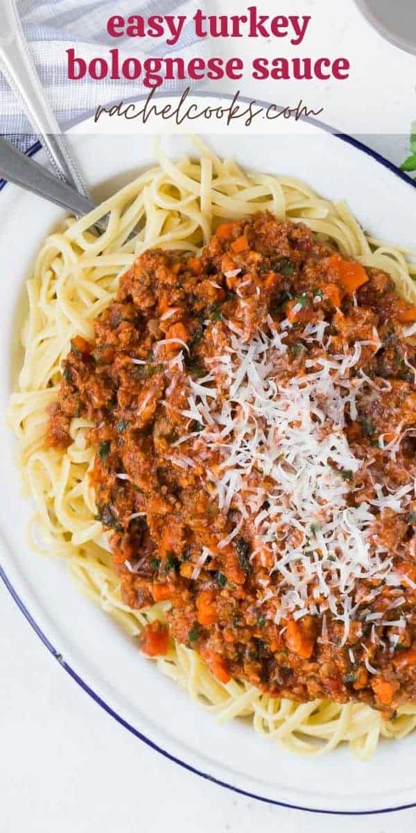 Large platter of pasta, text overlay reads "easy turkey bolognese sauce, rachelcooks.com"