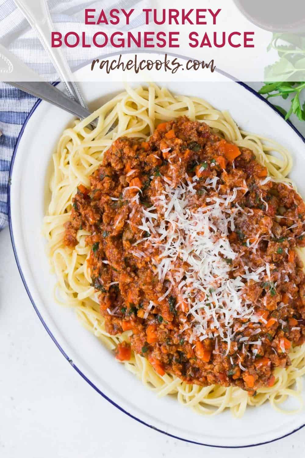 Large platter of pasta, text overlay reads "easy turkey bolognese sauce, rachelcooks.com"