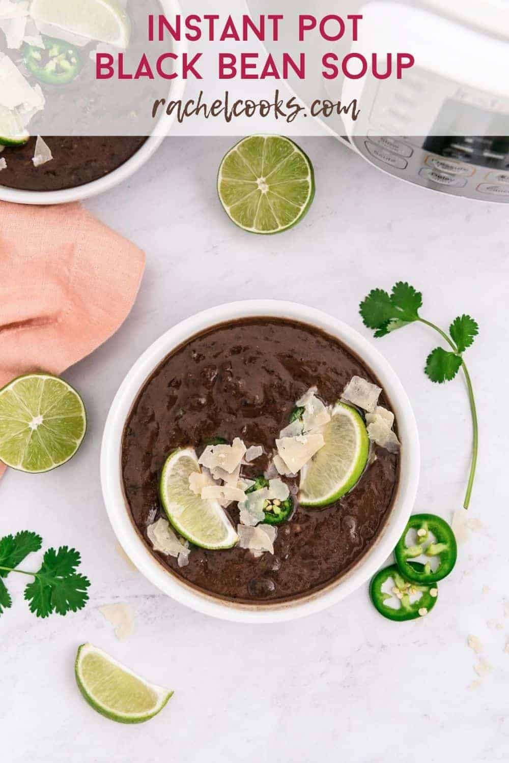 Overhead view of a bowl of soup, text overlay reads "instant pot black bean soup"