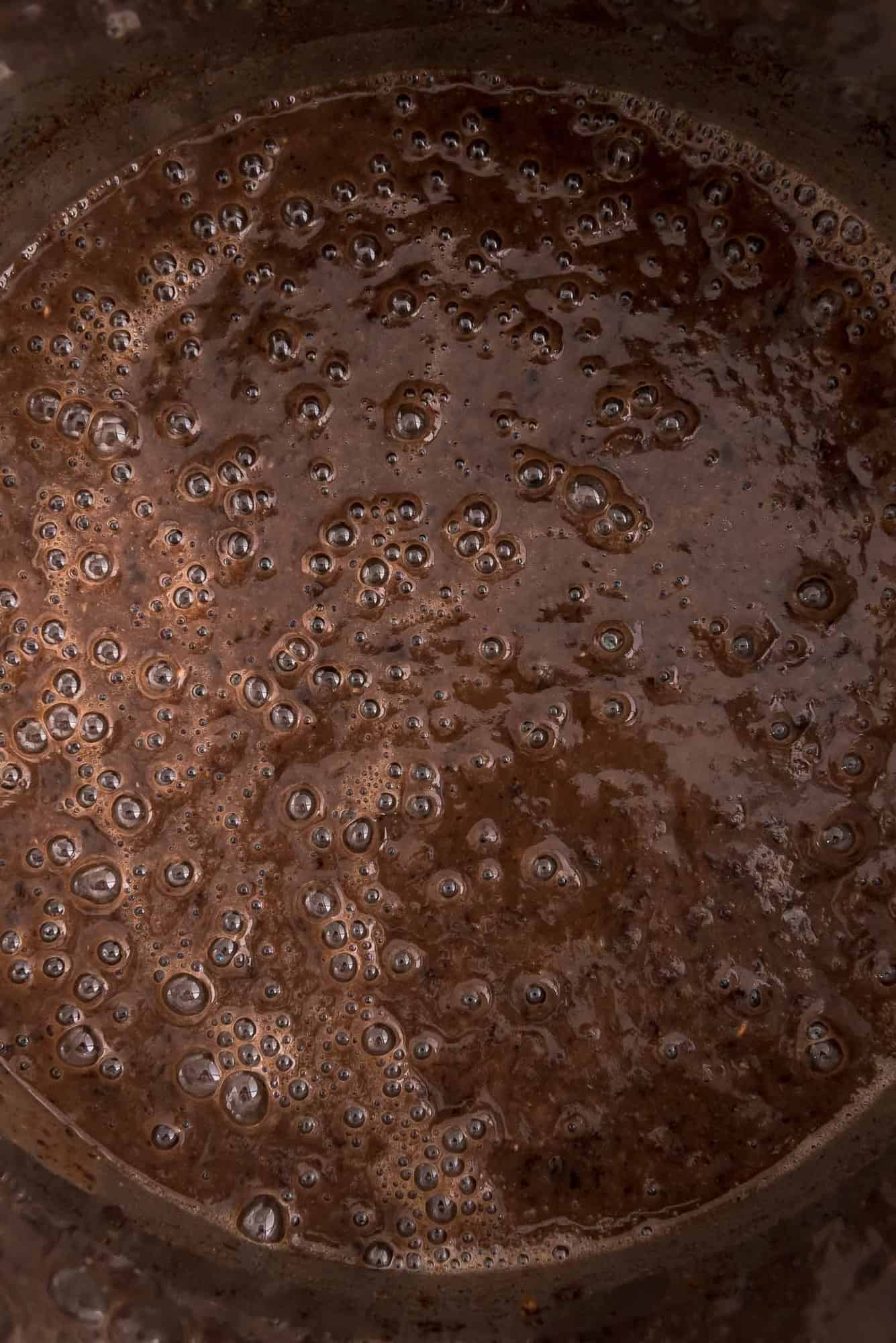 Close up view of black bean soup in an Instant Pot.