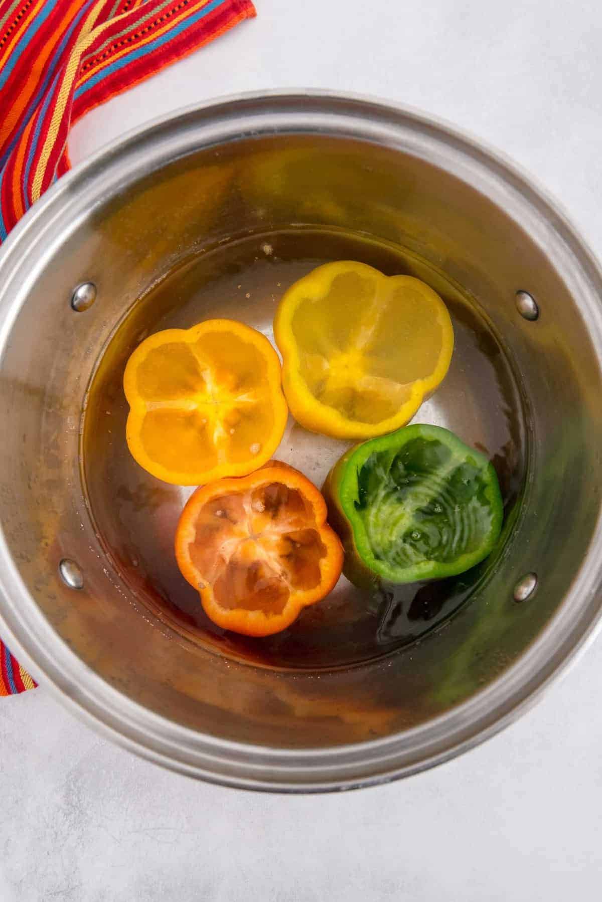 Peppers being blanched.