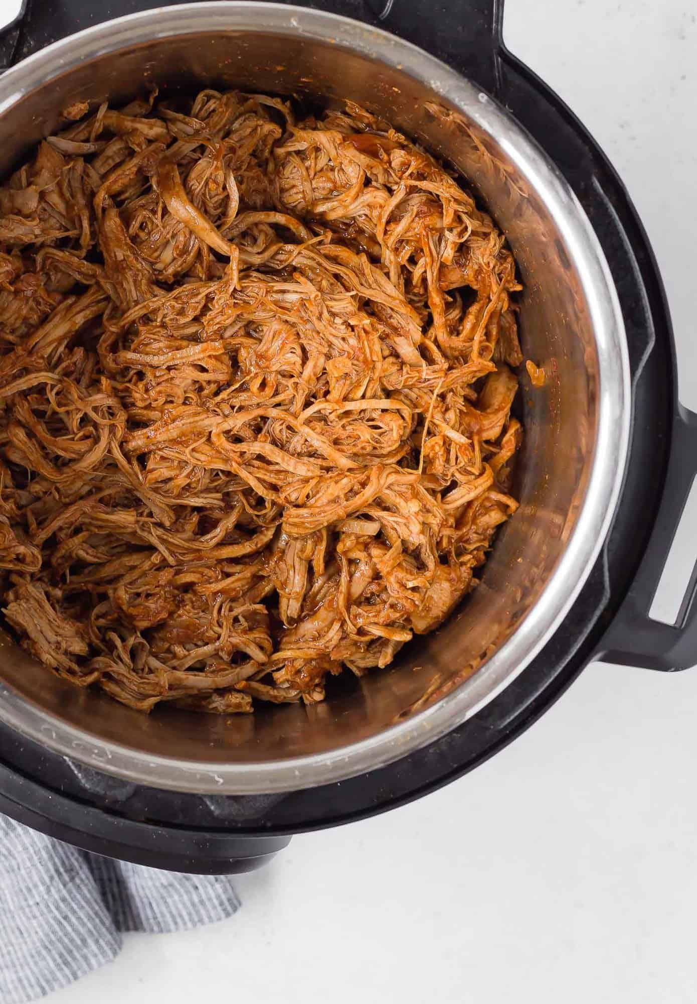 Instant pot Pulled pork in the instant pot, taken from overhead.