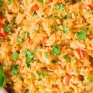 Colorful red rice, text overlay reads "easy mexican rice"