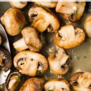 Cooked mushrooms in a pan, text overlay reads "sauteed mushrooms with white wine, rachelcooks.com"