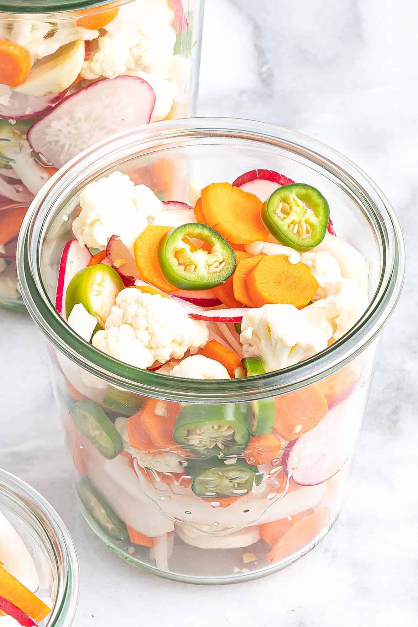 Vegetables in a glass jar.