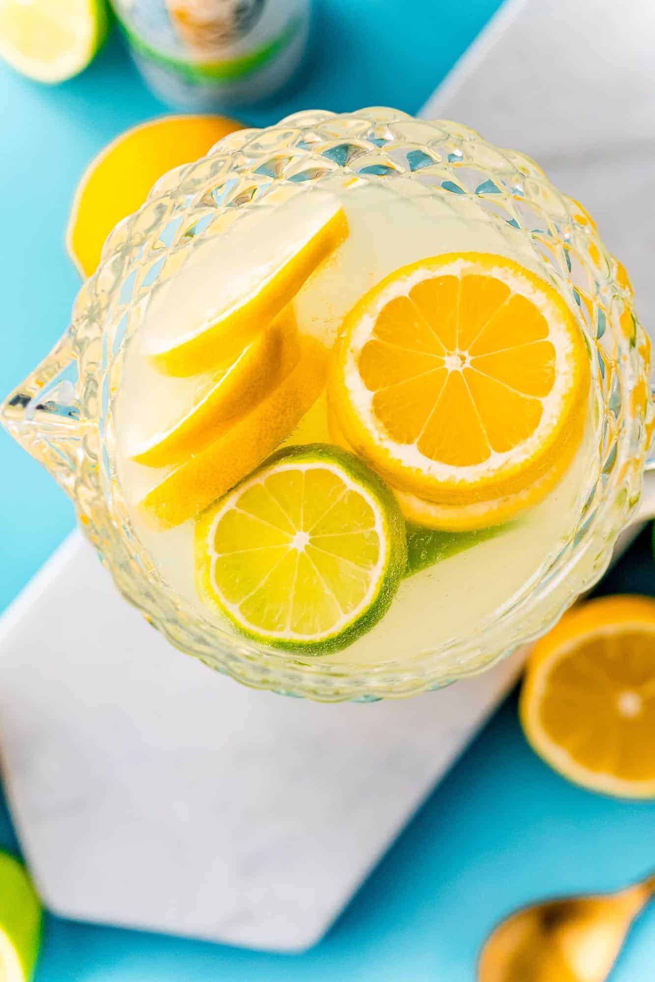 Overhead view of spiked lemonade in a pitcher.