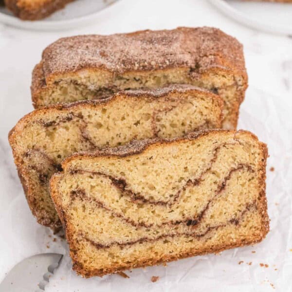 Three slices of cinnamon swirled snickerdoodle bread.