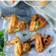 Cooked wings, text overlay reads "how to make air fryer chicken wings"