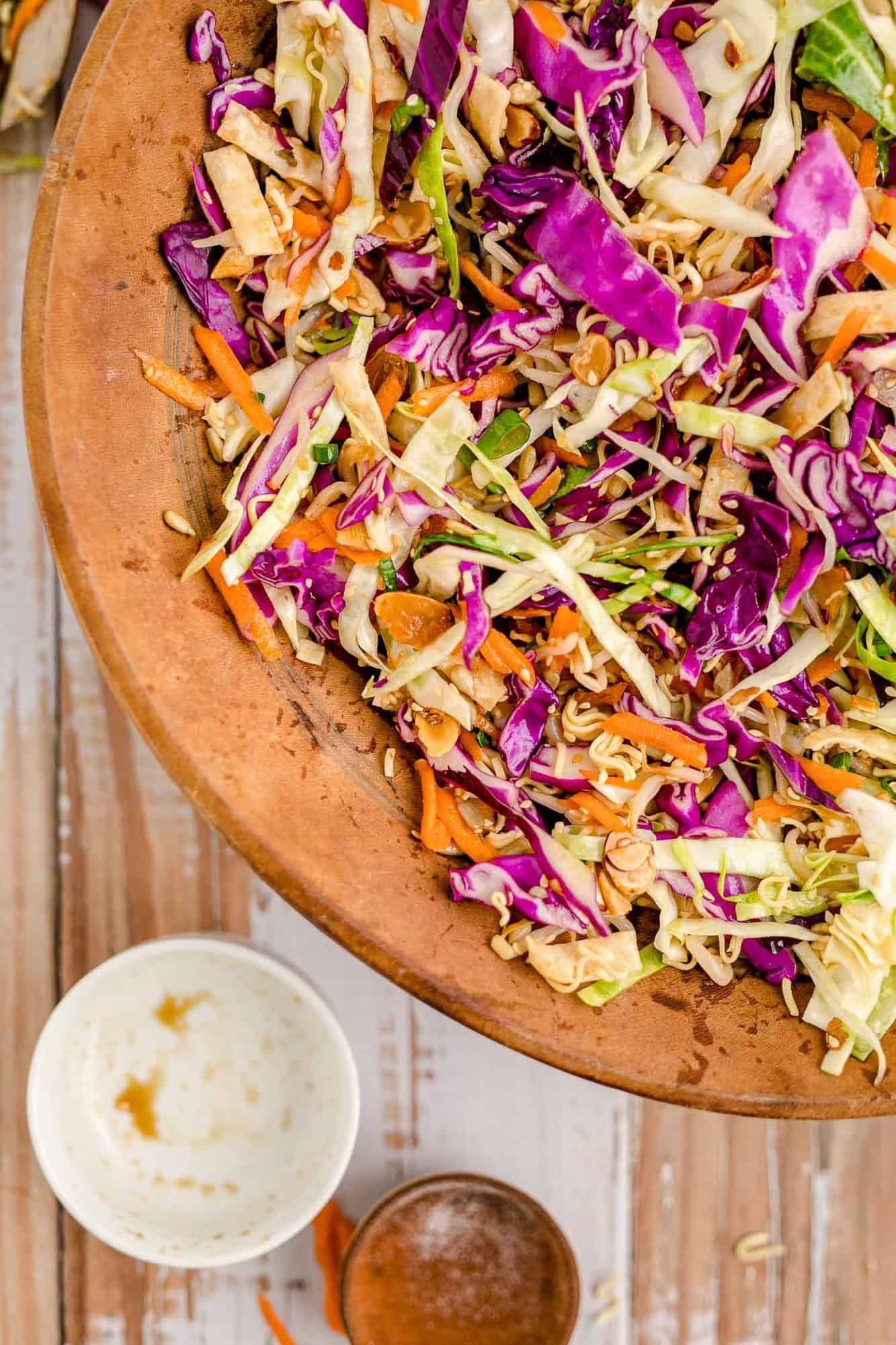 Close up of Asian salad in a wooden bowl.