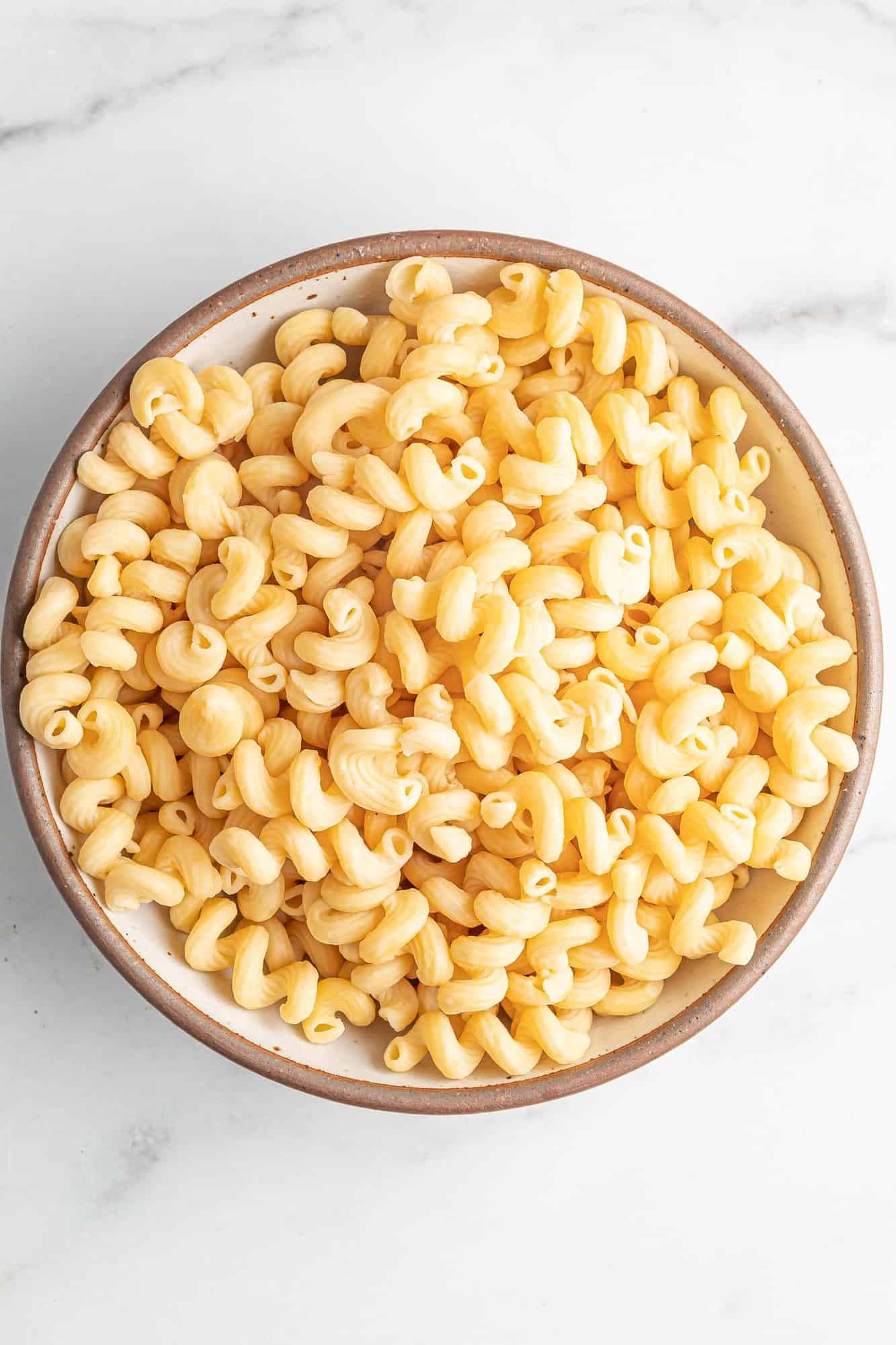 Cooked pasta in a large bowl.