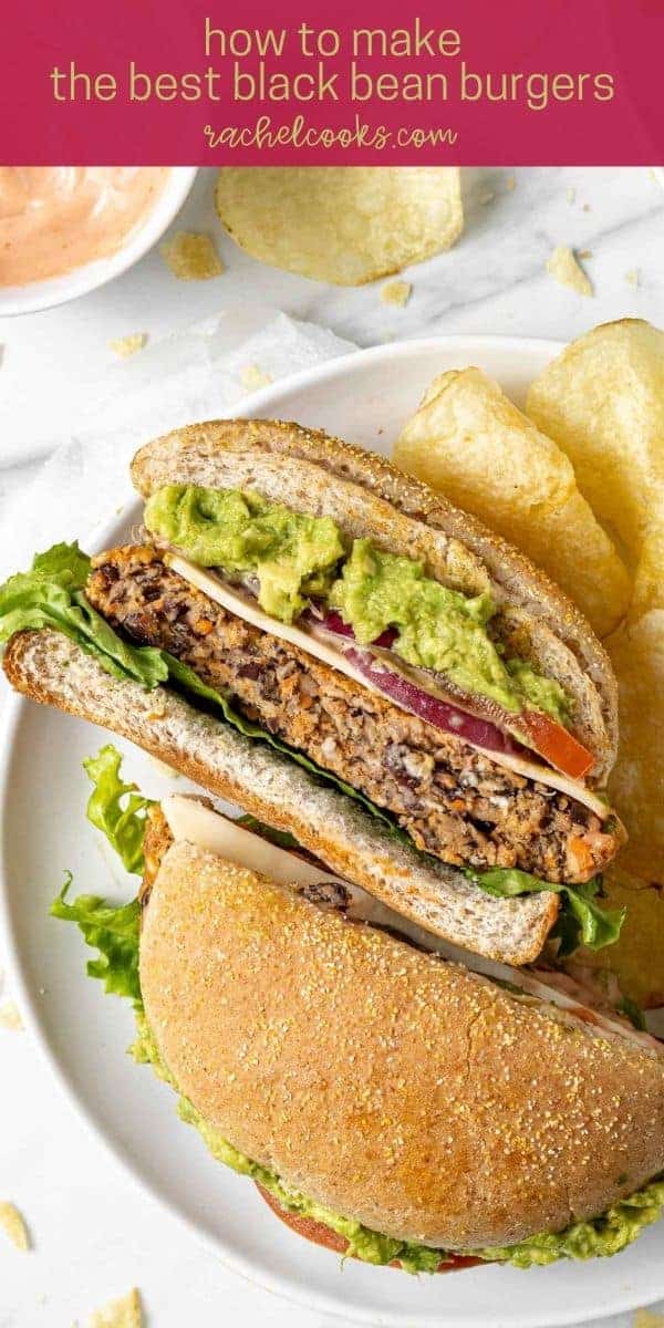 Black bean burger on a plate with chips, cut in half.