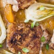 Chicken and oranges, text overlay reads "orange chicken thighs with bok choy, rachelcooks.com"