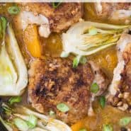 Chicken and oranges, text overlay reads "orange chicken thighs with bok choy, rachelcooks.com"