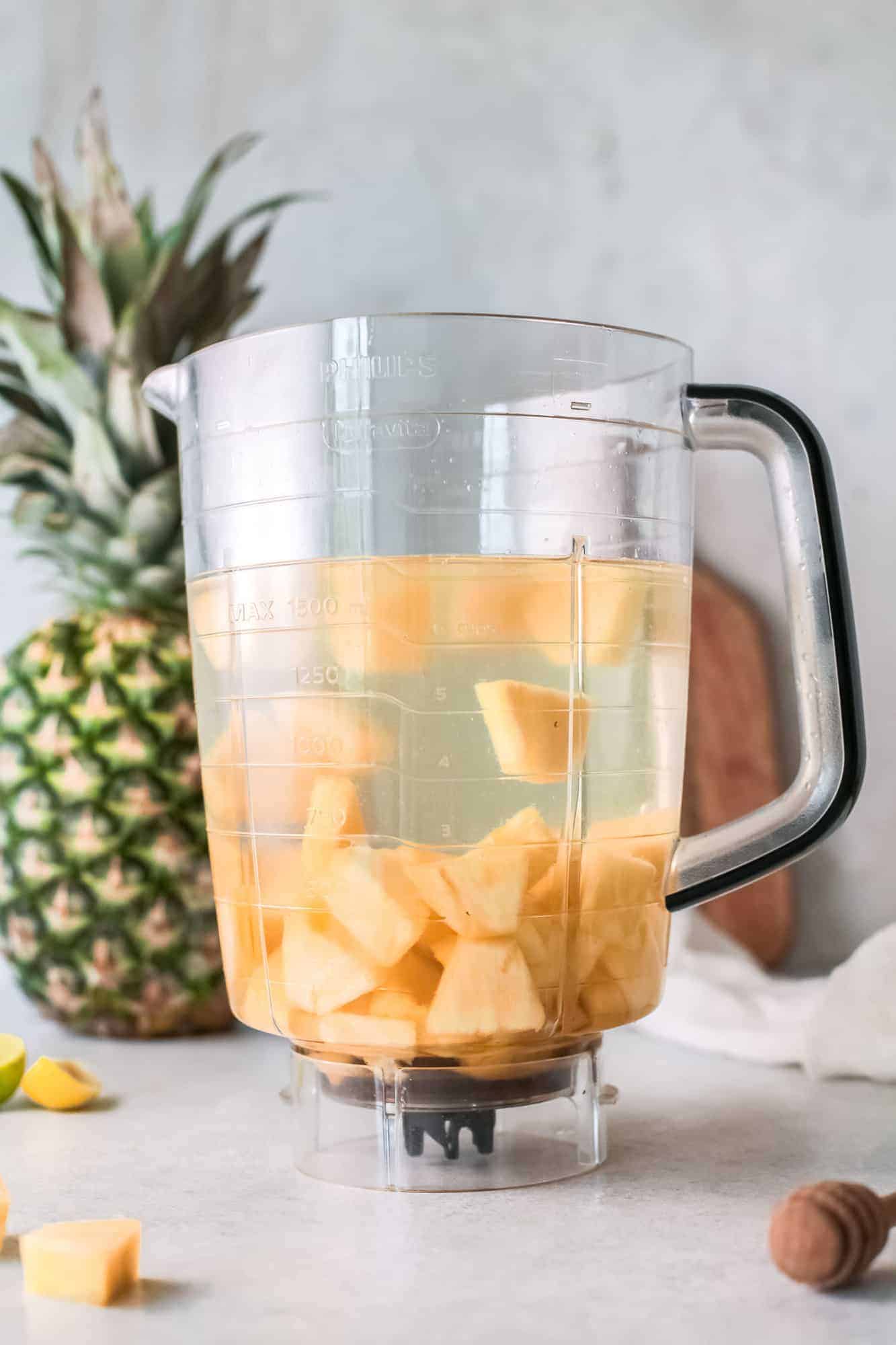 Pineapple and water in a blender.