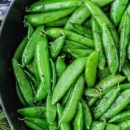 Bright green peas, text overlay reads "how to make sauteed sugar snap peas"