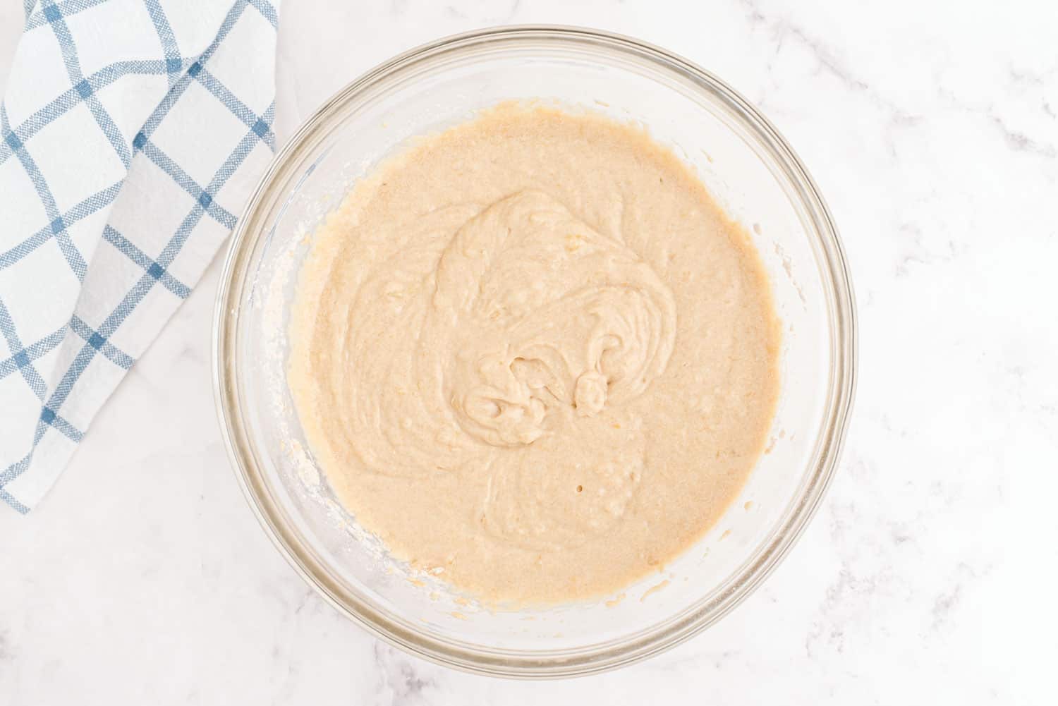 Cake batter in mixing bowl.