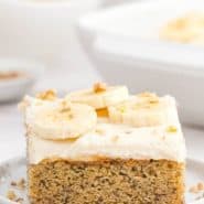 Cake on a plate, text overlay reads "the best homemade banana cake, rachelcooks.com"