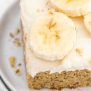 Cake on a plate, text overlay reads "the best homemade banana cake, rachelcooks.com"