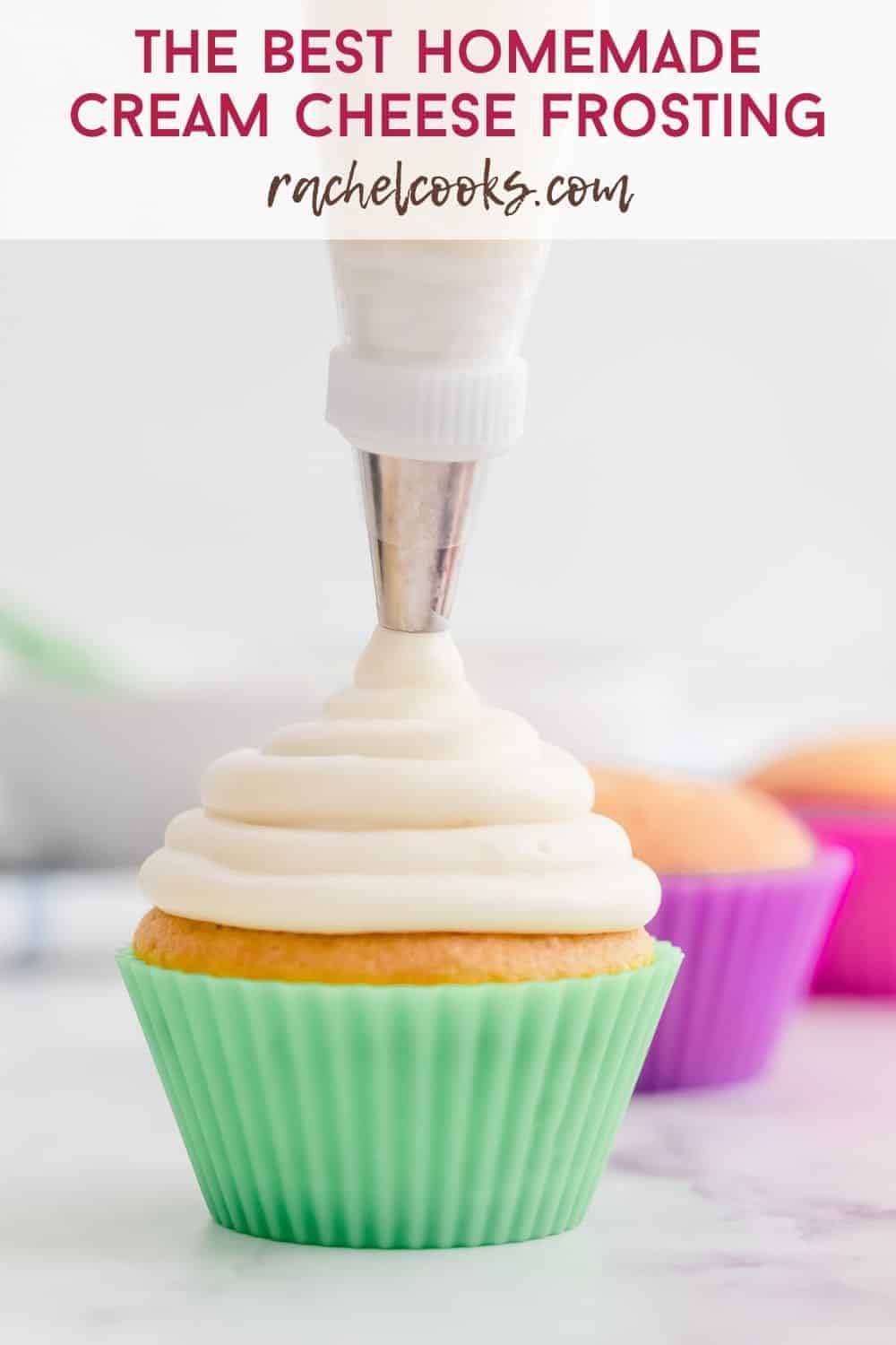 Frosting being piped on a cupcake, text overlay reads "the best homemade cream cheese frosting, rachelcooks.com"