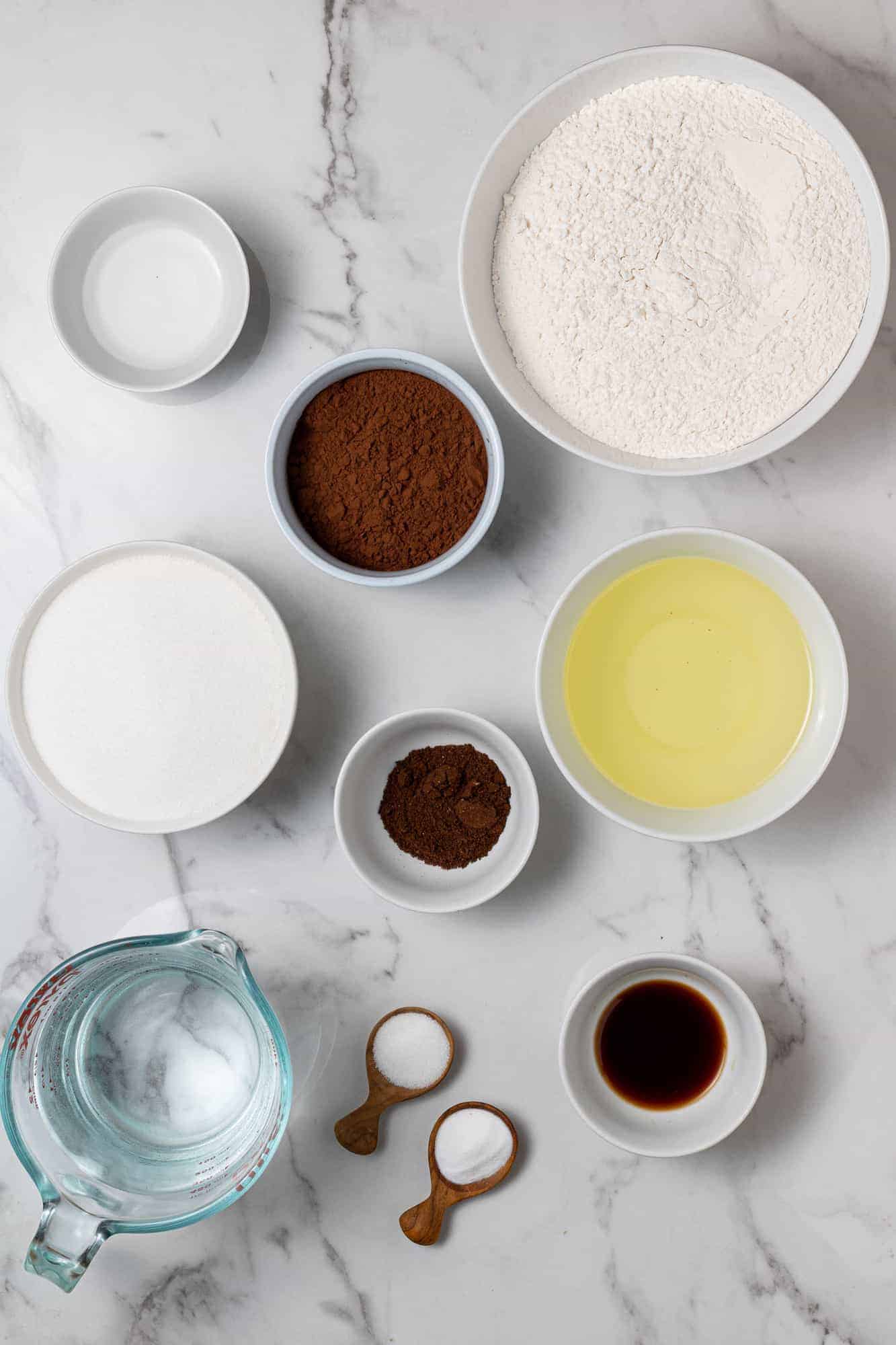 Overhead view of ingredients in small bowls.