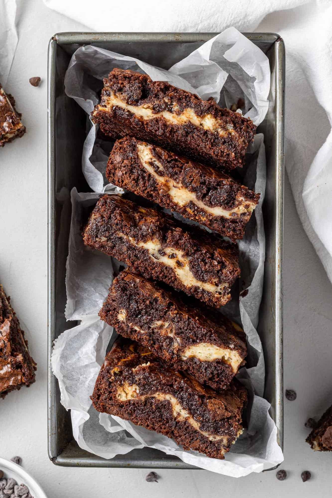 Brownies in a loaf pan to show filling.