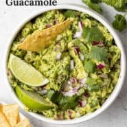 White bowl filled with guacamole, text overlay reads "the best homemade guacamole."