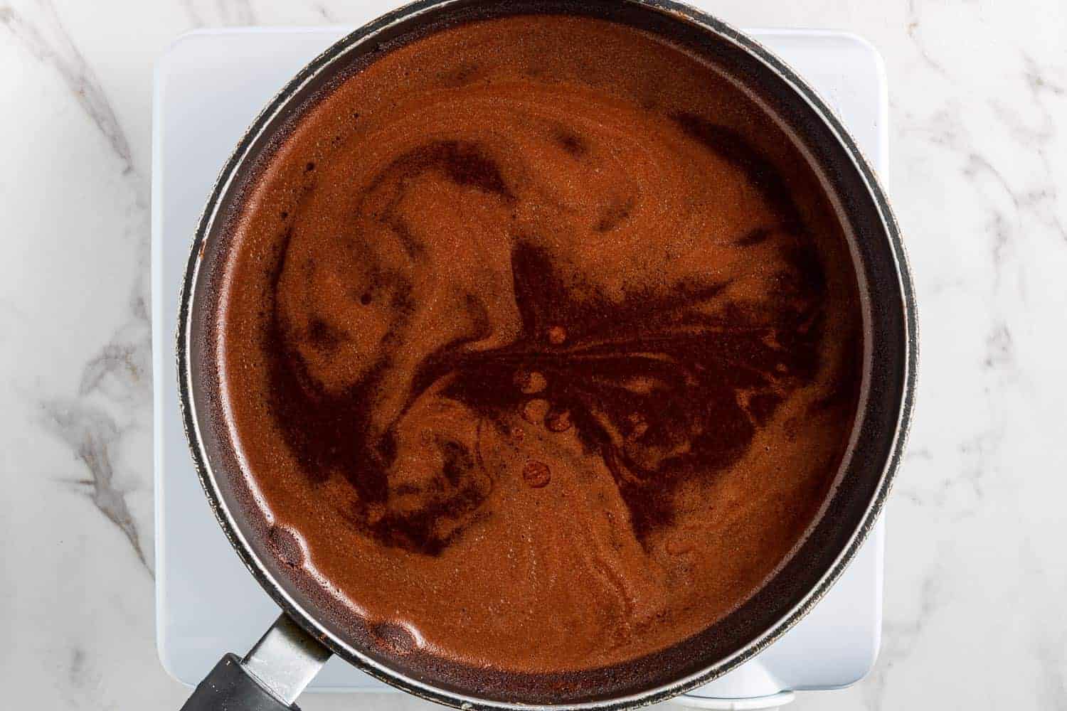 Chocolate in a saucepan.