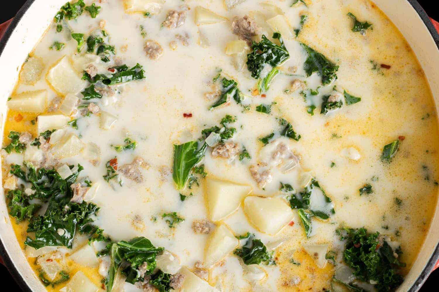 Creamy soup with kale, potatoes, and sausage.