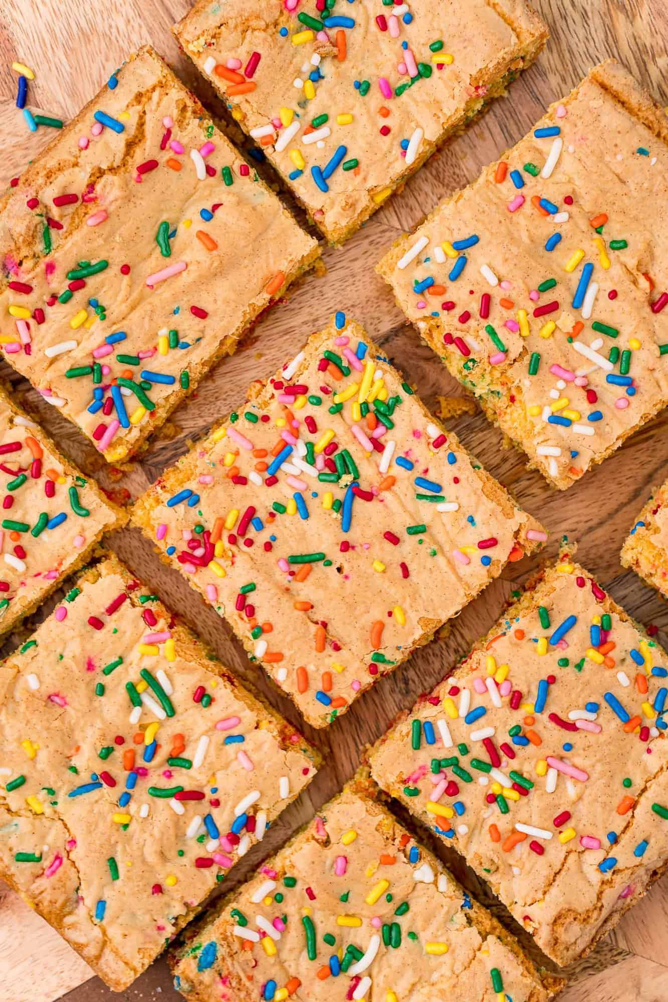 Overhead view of cut blondies with sprinkles.