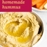 Bowl of hummus, text overlay reads "creamy homemade hummus."