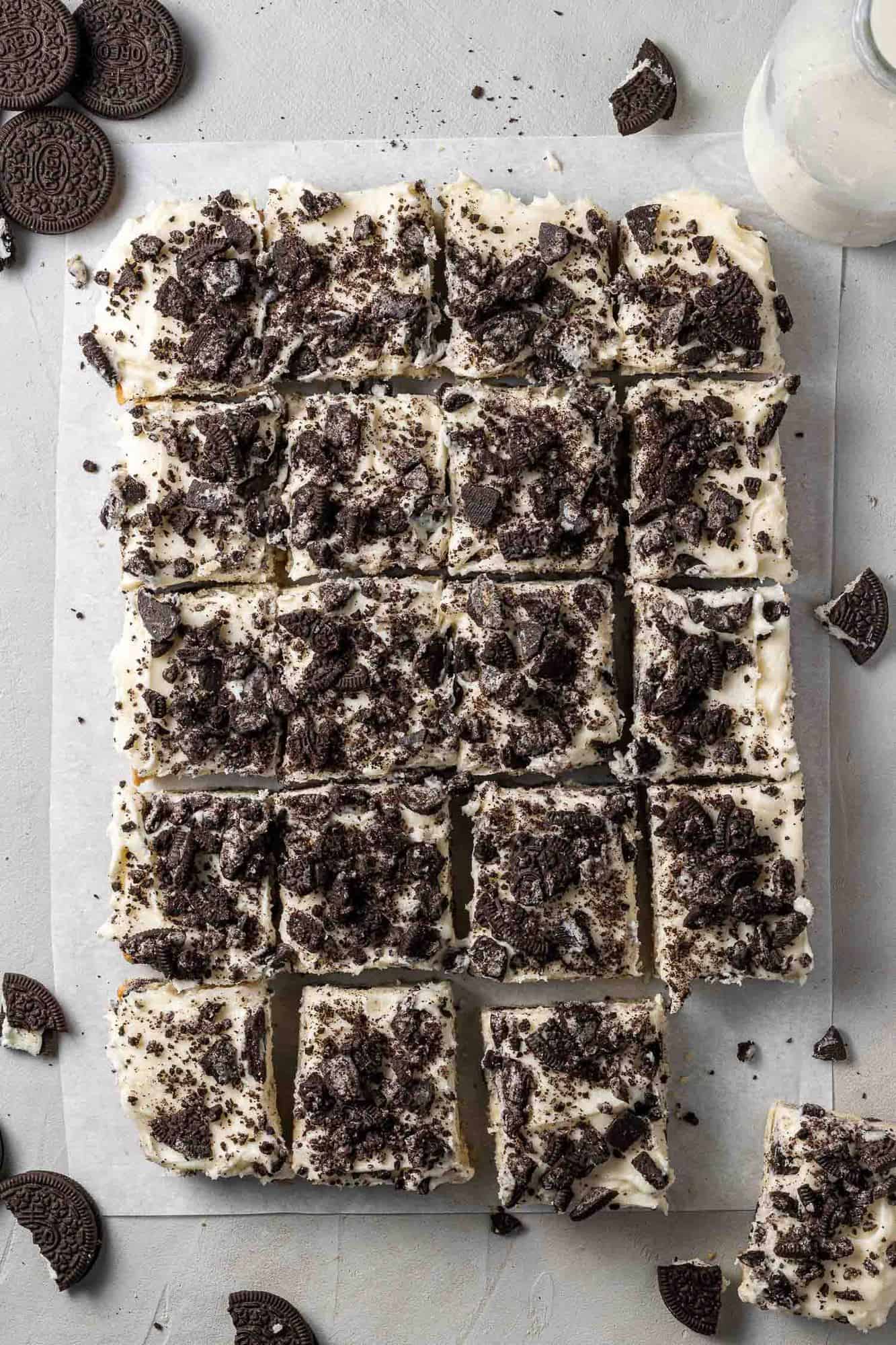 Cut cookie bars on top of parchment paper.