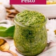 Jar filled with green sauce, text overlay reads "easy homemade pesto."