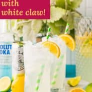 Tall glass of iced beverage, text overlay reads "vodka lemonade with white claw."