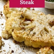 Cauliflower on a sheet pan, text overlay reads "how to make cauliflower steak."